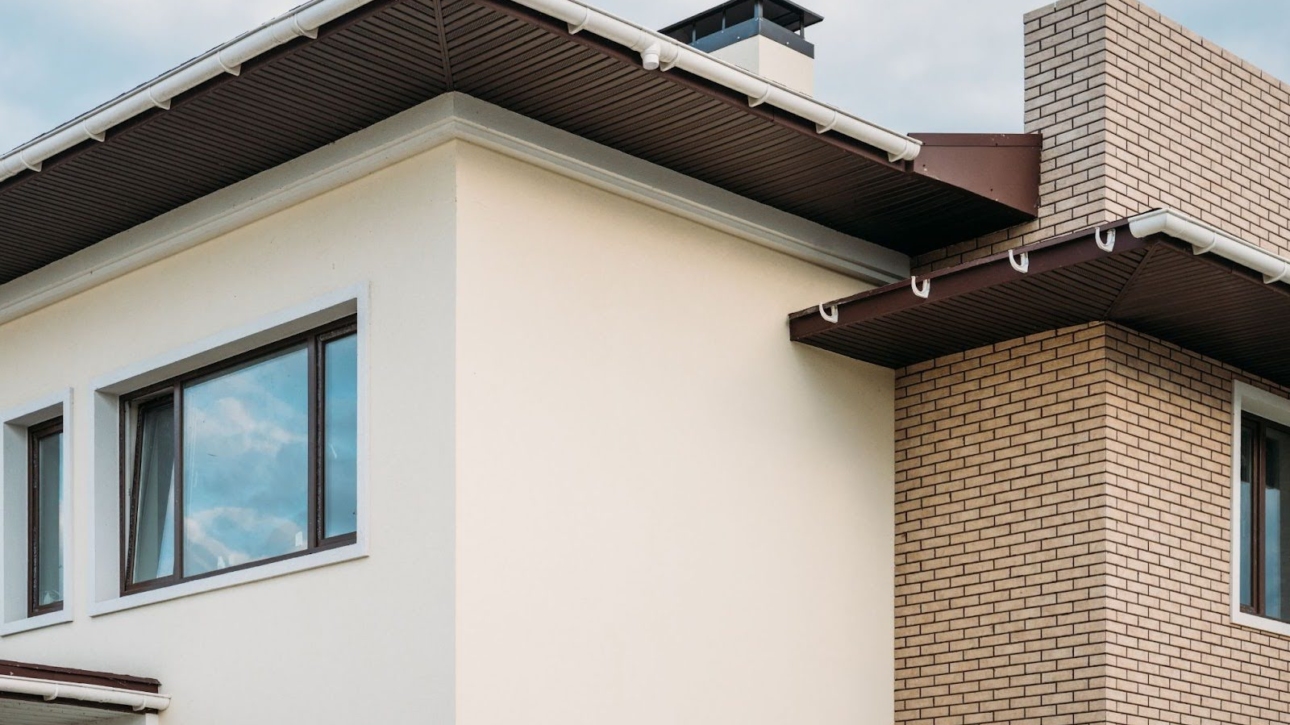 Gutters on the outside of a home.