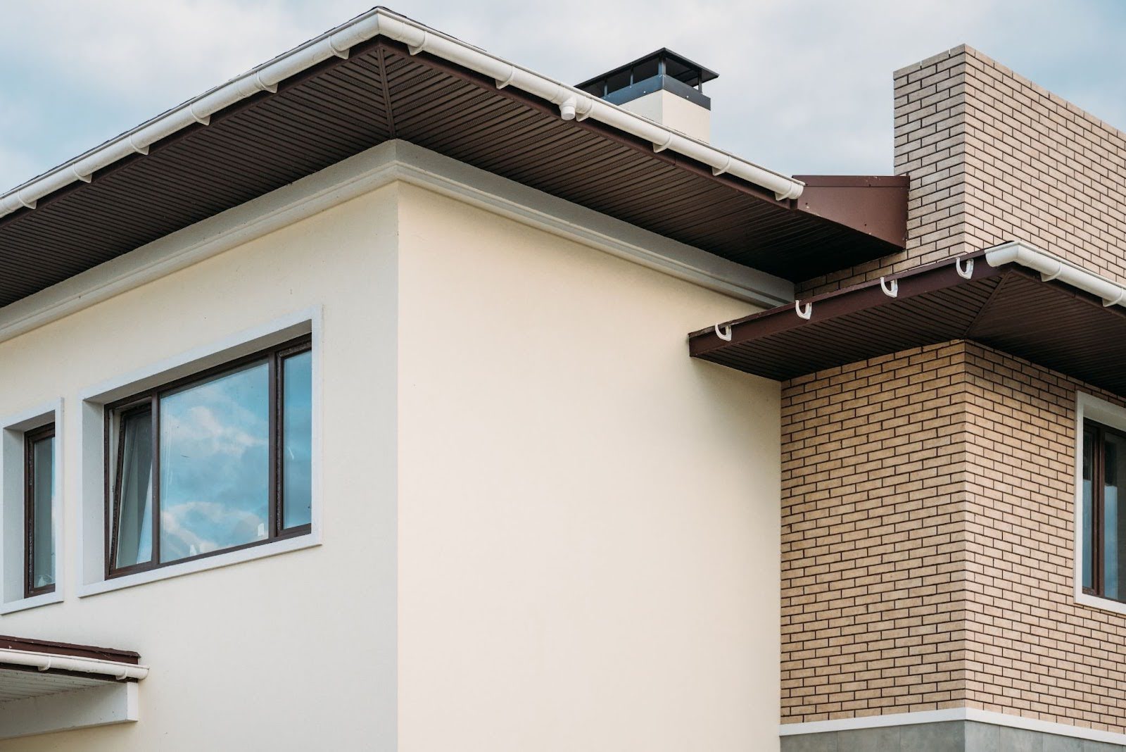 Gutters on the outside of a home.