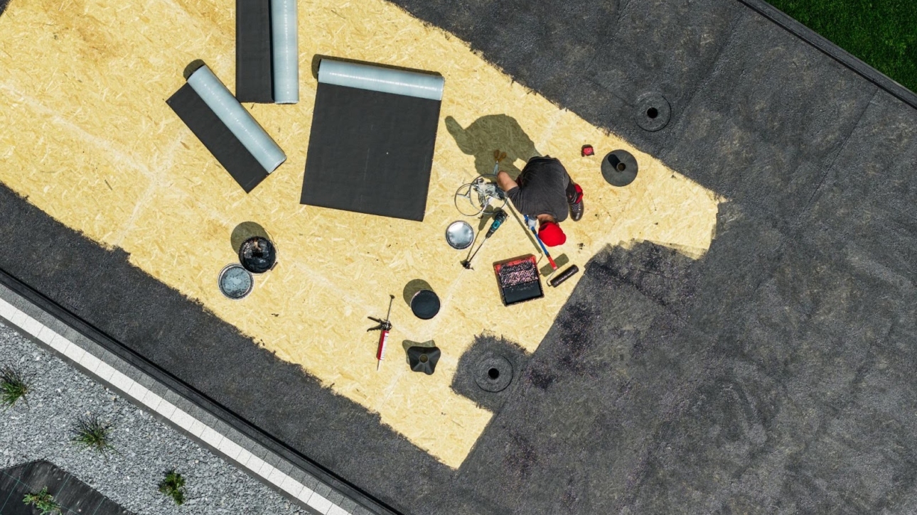 An aerial shot of the EDPM roof installation underway on a residential house.