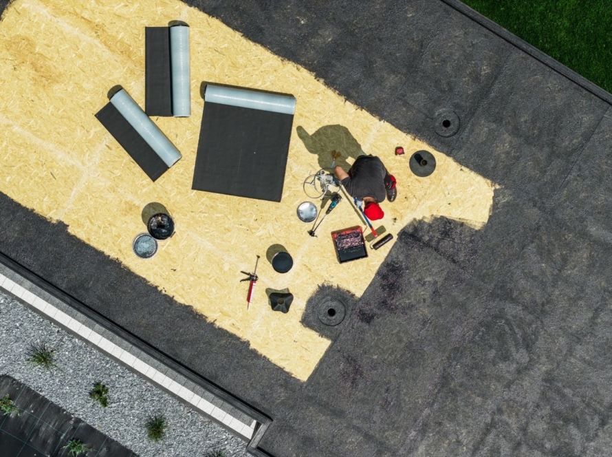 An aerial shot of the EDPM roof installation underway on a residential house.