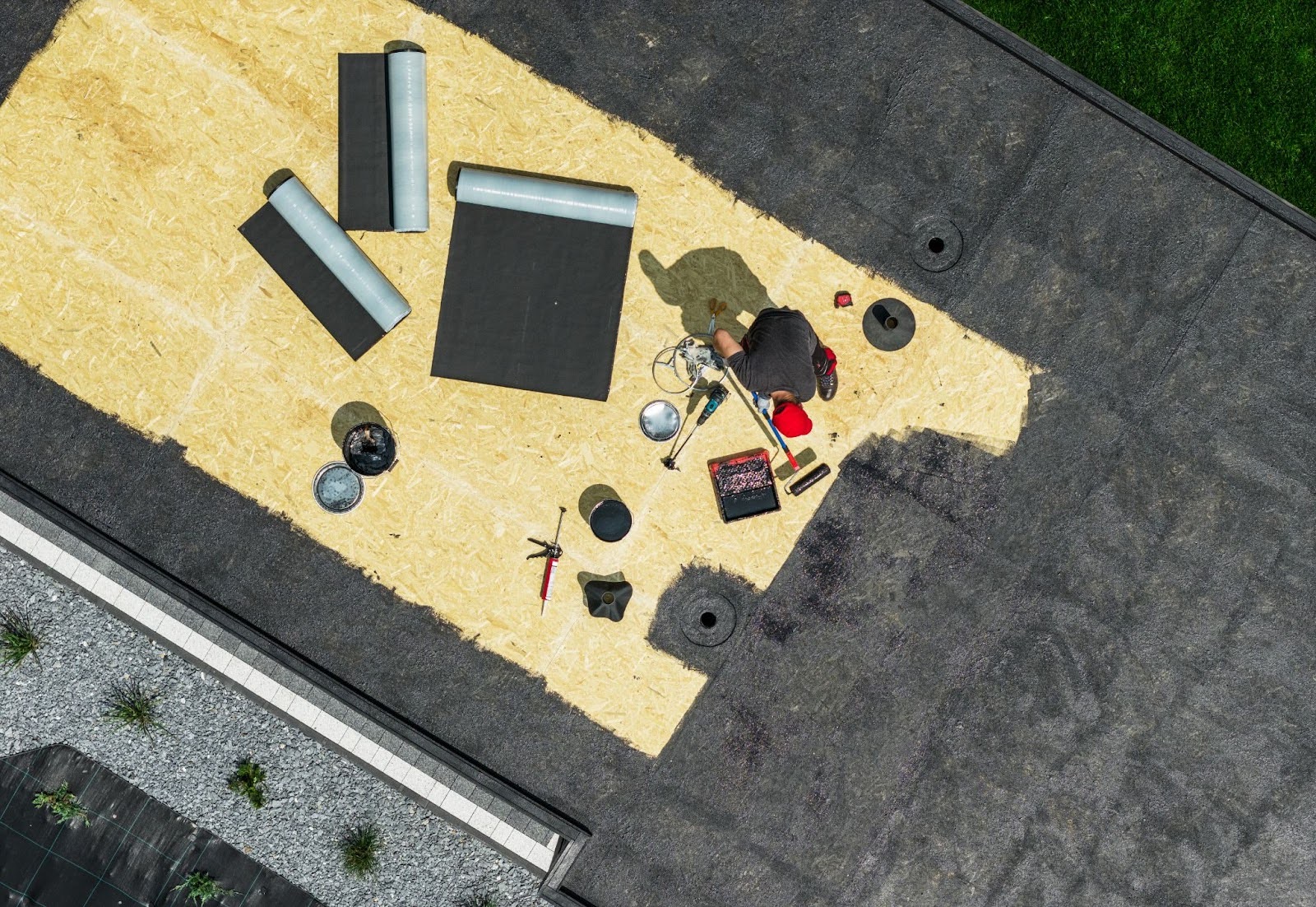 An aerial shot of the EDPM roof installation underway on a residential house.